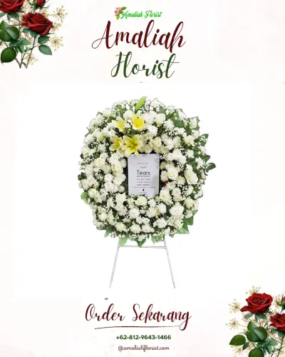 Krans Bunga Duka Cita di Batudinding